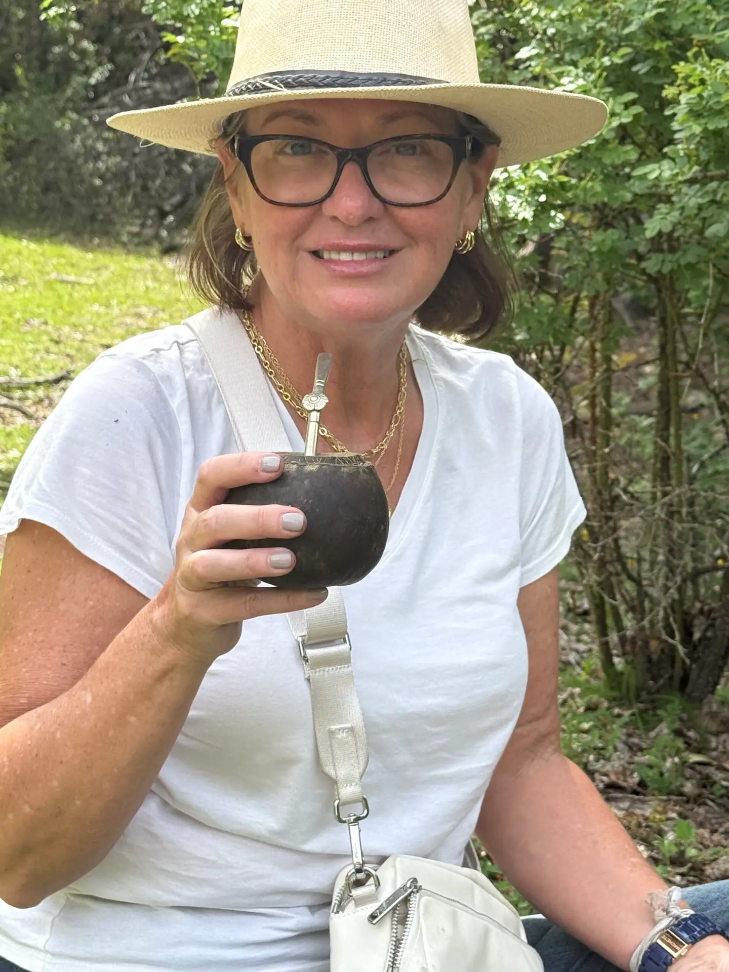 Anne Marie enjoying her first Mate (MAH-tay), an infusion of dried yerba leaves and hot water, that is a sort of sacred ritual is Argentina's Patagonia region.
